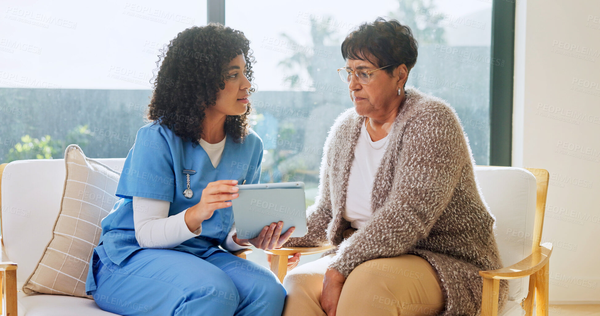 Buy stock photo Caregiver, checkup and old woman at house with tablet, research or medical report for diagnosis. Nurse, review and senior person in home with digital, assisted living and online survey for healthcare