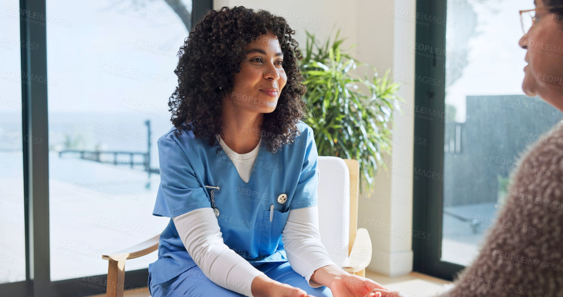 Buy stock photo Holding hands, smile and nurse with senior woman in retirement home for medical checkup. Comfort, conversation and caregiver with elderly patient for healthcare service at consultation in house.