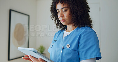 Buy stock photo Nurse, woman and reading in clinic with tablet, online research and medical report for telehealth. Healthcare worker, person and browsing in hospital with tech, schedule and patient care records.