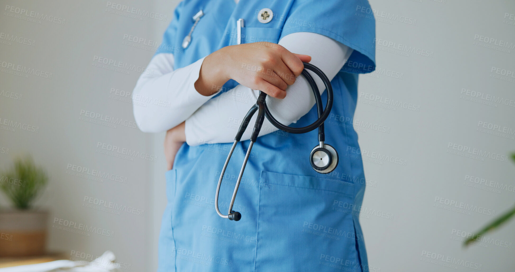 Buy stock photo Doctor, hands or arms crossed in clinic with stethoscope, cardiology specialist or medical expertise. Career, person or heart health physician in office with cardiologist tools, experience or job.