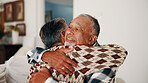 Love, hug and senior couple in home for relationship security, smile and partner commitment. Happy people, care and embrace in retirement with trust, support or connection together with loyalty