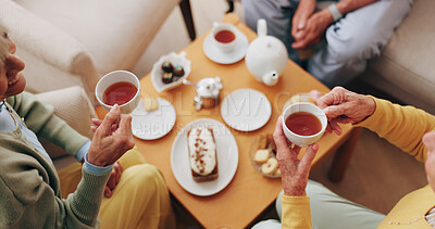 Buy stock photo Senior, hands and friends with tea party in home for social gathering, supportive community and chat. Above, people and drink with cake in house for conversation, retirement bonding and weekend visit