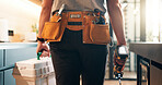 Handyman, tools and back of man in kitchen for plumbing service, maintenance and repair in home. Walking, house and person with utility belt, equipment and toolbox for project, renovation and fixing