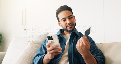 Buy stock photo Credit card, phone and man on sofa for online shopping, digital purchase and internet banking. Sale, home and person on mobile app for debit info for ecommerce, subscription and discount on website