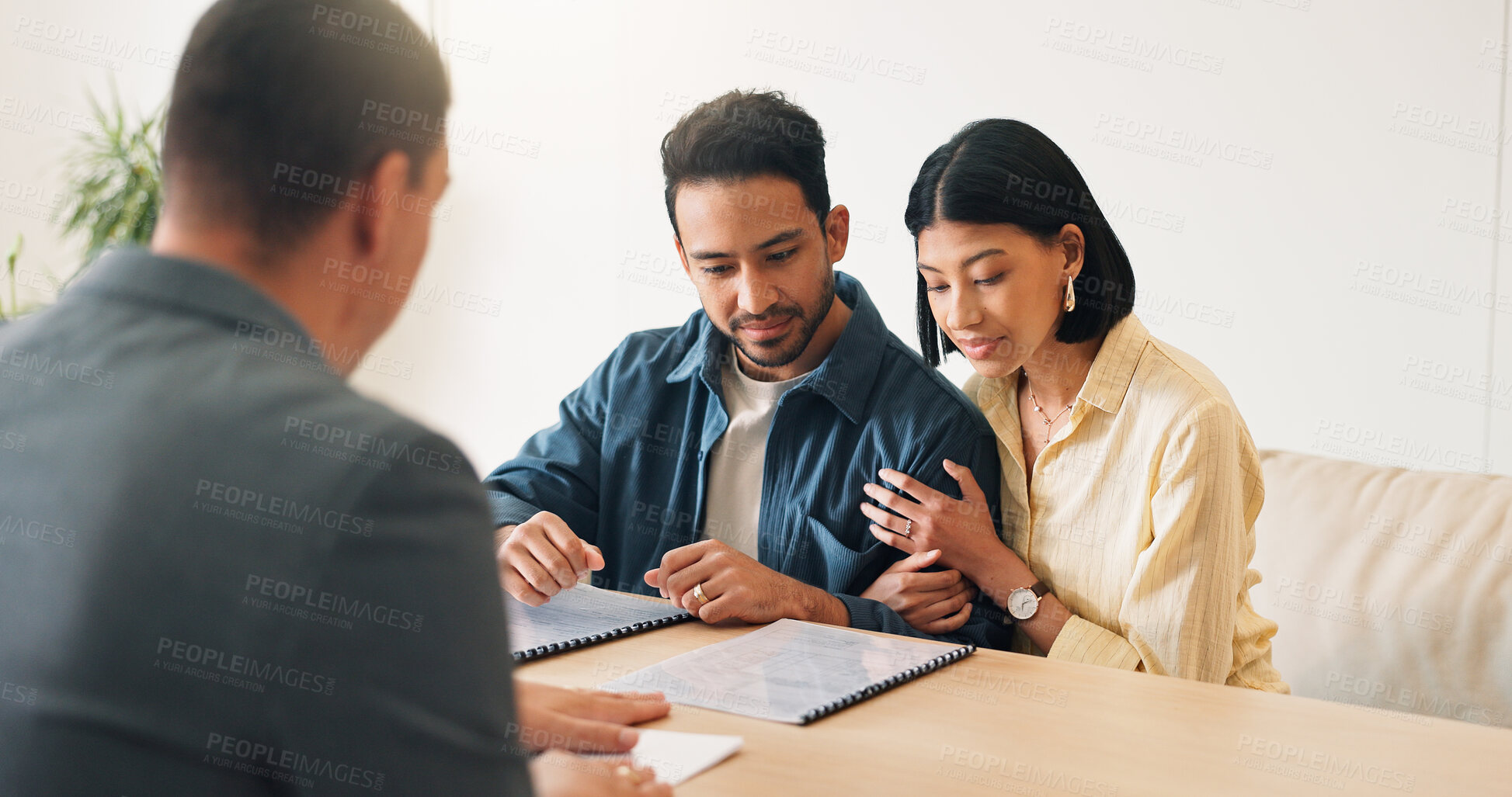 Buy stock photo Couple, reading and advisor in office with document, finance report and application for real estate. People, meeting and realtor with paperwork, property investment and financial form for purchase