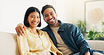 Happy, portrait and couple on sofa in home with bonding, love and connection in marriage on weekend. Smile, relax and man embracing woman in living room for commitment, care and affection in house.