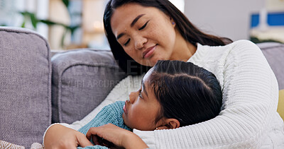 Buy stock photo Comfort, hug and mom with sad girl on sofa for bonding, relationship and support in living room. Family, gentle parenting and mother with child embrace on couch for safety, care and love in home