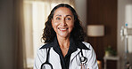 Medical, portrait or doctor in hospital with smile, clinical service or pride as physician. Happy, ambition or mature woman with confidence, general practitioner or about us in healthcare industry.