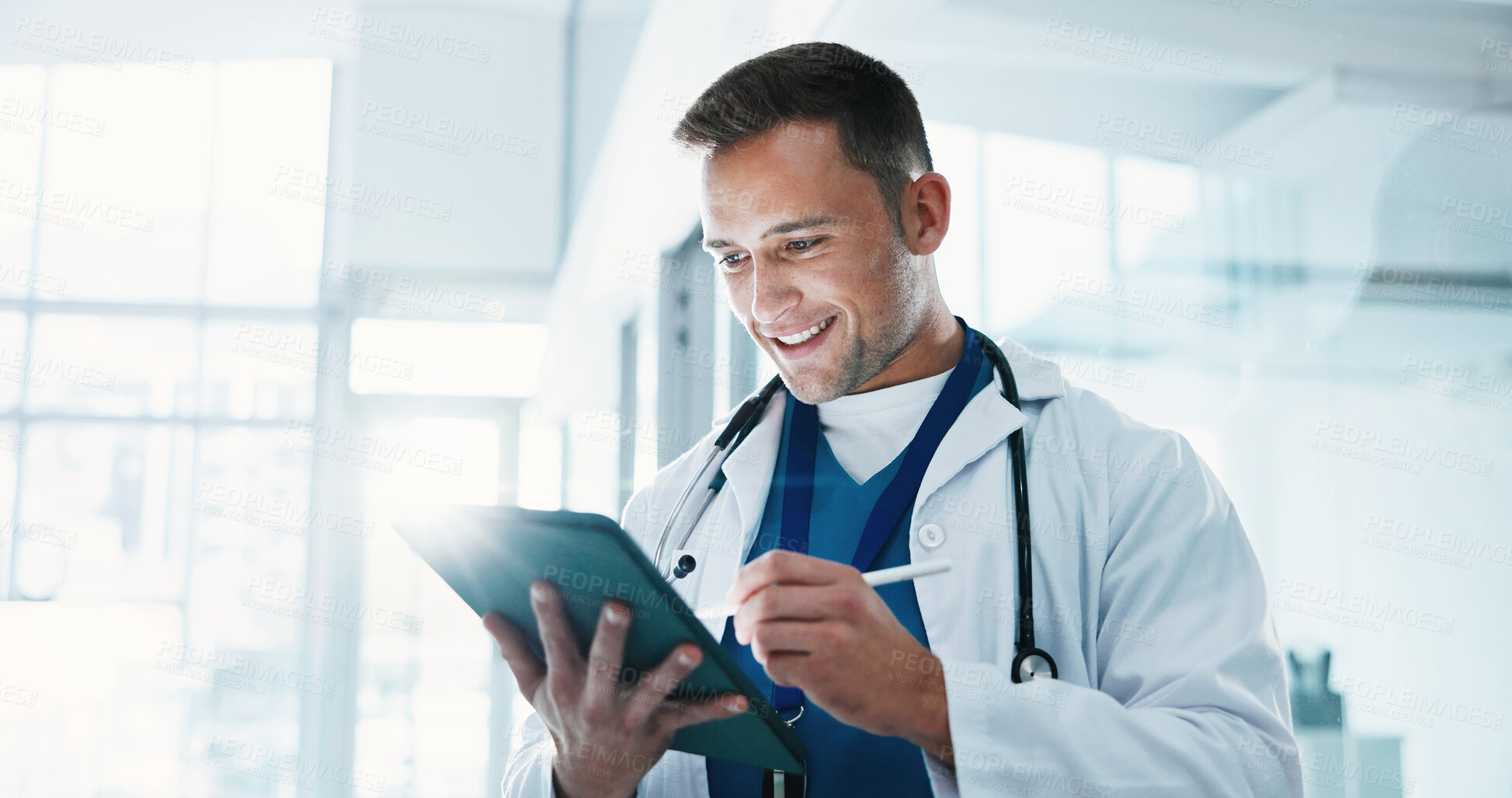 Buy stock photo Pen, doctor and man with tablet for research, medical schedule or reading patient history in hospital. Tech, stylus and happy worker with healthcare update, results and assessment report with flare