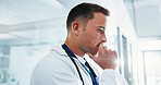 Man, doctor and thinking in hospital with stress, fatigue or frustrated with bad news mistake. Mental health, sad physician and medical person with anxiety for grief, loss or failed surgery in clinic