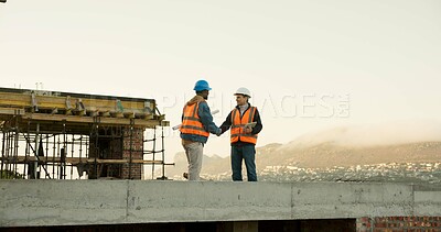 Buy stock photo Handshake, construction and men on rooftop for meeting, agreement and approval for architecture. Engineering, contractor and people shaking hands for building project, planning and infrastructure