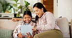 Tablet, happy and mother with child on sofa in home for playing educational game on app together. Smile, digital technology and mom with girl kid for online gaming with learning in apartment.