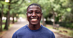 Fitness, portrait and smile with black man outdoor in park for start of cardio training or workout. Commitment, confidence and exercise with happy runner in nature for challenge, dedication or health