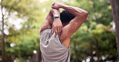 Buy stock photo Athlete, exercise and man stretching at park for post fitness, muscle tension relief and wellness. Active, back and runner with arm warm up in nature for cardio recovery, physical activity and health