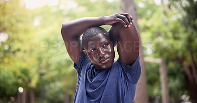 Buy stock photo Athlete, workout and man stretching at park for post fitness, muscle tension relief and wellness. Runner, black person and  arm warm up in nature for cardio recovery, physical activity and exercise