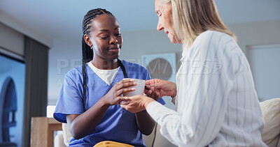 Buy stock photo Caregiver, support and coffee in nursing home for old woman, medical assistance and wellness checkup. Nurse, help and senior person in living room with tea, kindness and healthcare for retirement.
