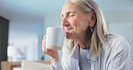 Mature, woman and smell coffee in home with wellness, thinking and relax for peaceful weekend break. Calm, happy and female person rest in living room with drink aroma, morning reflection and vision.
