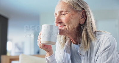 Buy stock photo Mature, woman and smell coffee in home with wellness, thinking and relax for peaceful weekend break. Calm, happy and female person rest in living room with drink aroma, morning reflection and vision.