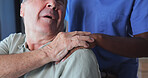 Holding hands, support and nurse with senior man in nursing home for empathy, consoling or help. Comfort, healthcare advice and caregiver with elderly patient in retirement for medical checkup.