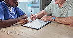 Nurse, hands and old man in retirement home with paperwork, health insurance application and help. Caregiver, elderly person and assistance in house with medical aid policy, documents or registration
