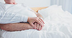 Elderly, couple or holding hands with comfort in bed for understanding or empathy in nursing home. Senior, man and woman with touch or sympathy for healthcare, medical help or compassion in house