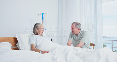 Buy stock photo Senior, couple and serious visit at hospital bed for recovery concern, surgery complication or worry. Marriage, elderly people and talk in clinic ward for functional decline, stress or discharge risk