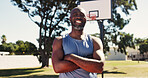 Pride, portrait or black man on basketball court with arms crossed, practice or fitness hobby on weekend. Active, happy or mature person with confidence, hoop sport or training in outdoor game.