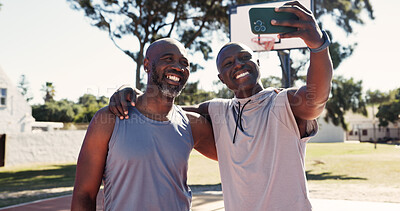 Buy stock photo Selfie, father and adult son at basketball court with hug, fitness and bonding together on weekend. Happy, black people and mature dad outdoor in park with embrace, picture and sports for wellness.