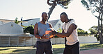 Black people, talking and ball on court for basketball, instruction and technique for match. Man, coach or player in nature for fitness, sports training and practice feedback for friendly competition