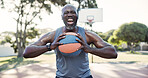 Angry, black man and ball at park for basketball, practice match and weekend hobby for contest. Portrait, mature person and scream on court for fitness, sports training and ready for competition game