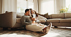 Relax, calm and couple with dog on sofa in home for peaceful weekend together with pet adoption. Companion, puppy and people with animal in living room for bonding, connection or care in apartment.