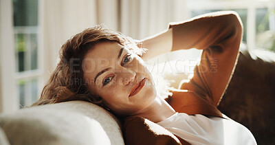 Buy stock photo Smile, relax and portrait of woman on sofa in home for calm, positive attitude or peace in morning. Happy, confident and person on couch in living room with chilling, break or weekend in apartment.