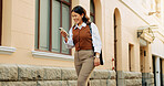 Walking, happy and businesswoman with phone in city with texting or email on finance report. Smile, technology and financial advisor commuting with cellphone for update on investment growth in town.