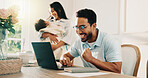 Fist pump, laptop and remote work with happy man in family home for celebration, success or victory. Achievement, computer and excited father at table in apartment as small business freelancer