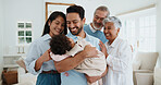Grandparents, laughing and family with baby in home, smile and visit with child on weekend and love. Senior parents, care and happy people with little girl, embrace and connection together in house