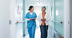 Nurse, checkup and woman at hospital with tablet, test results and medical history for diagnosis. Employee, walking and mature person in lobby with digital, patient discharge and healthcare records