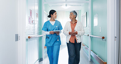 Buy stock photo Nurse, checkup and woman at hospital with tablet, test results and medical history for diagnosis. Employee, walking and mature person in lobby with digital, patient discharge and healthcare records