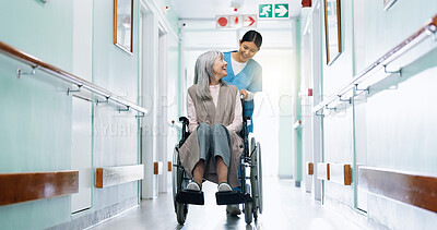 Buy stock photo Push, wheelchair and nurse in clinic with old woman, medical assistance and happy for rehabilitation. Healthcare worker, smile and senior person with disability, healing or advice in hospital hallway