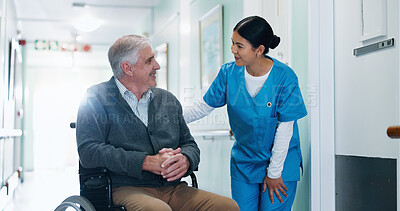 Buy stock photo Conversation, nurse and senior man in wheelchair at hospital for consultation, healthcare or support. Happy, caregiver and elderly person with disability for medical checkup in clinic corridor.