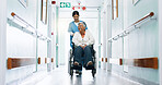 Happy, nurse and woman in hospital with wheelchair, medical assistance and help for stroke recovery. Healthcare worker, smile and mature person with disability, healing and support in clinic hallway.