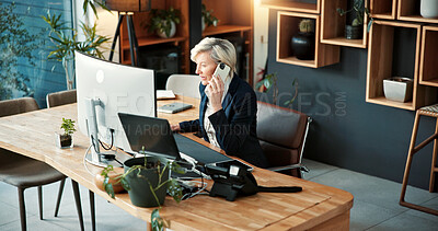 Buy stock photo Corporate, woman and phone call in office with computer, research and buyer approval for real estate. Above, mature realtor and mobile in workplace with pc, positive feedback and auction negotiation