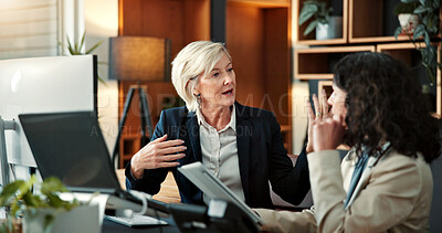 Buy stock photo Business, people and meeting in office with tablet, personal assistant or planning online schedule. Mature women, manager and executive secretary in agency with tech, review calendar and discussion.