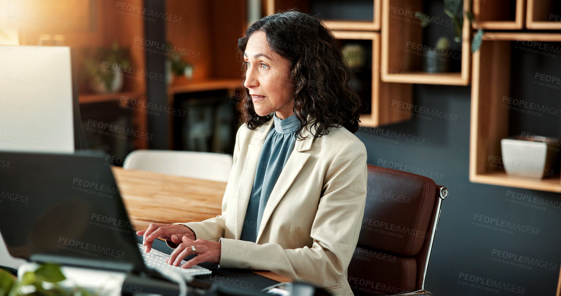 Buy stock photo Business, woman and reading in office with computer, research and online evidence for court case. Mature person, lawyer or typing in workplace with pc, witness testimony and investigation for justice