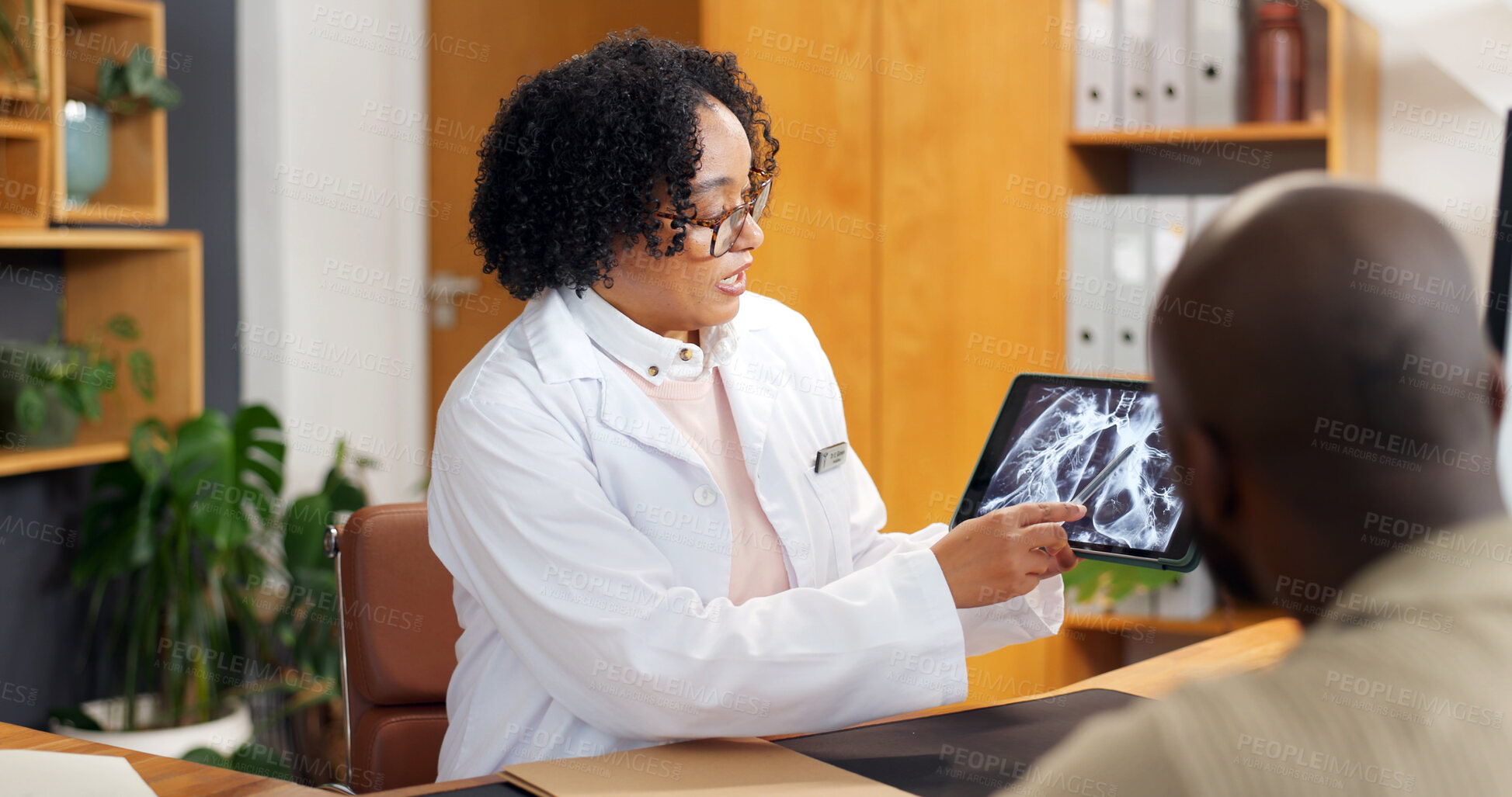 Buy stock photo Consulting, tablet screen and xray with doctor of patient in office for feedback or MRI review. Advice, radiology and results with medical professional speaking to person in hospital for diagnosis