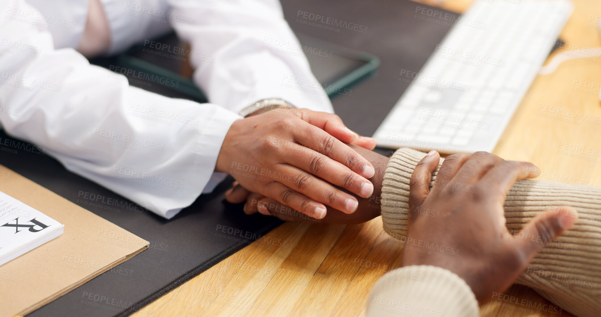 Buy stock photo Doctor, patient and holding hands in office with comfort, bad news or assurance for disease recovery. Healthcare worker, people and console in clinic with diagnosis, empathy and emotional support.
