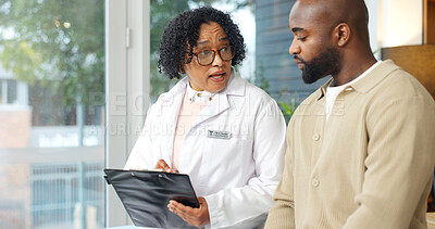 Buy stock photo Doctor, clipboard and talk in office with patient, medical survey and ask questions about symptoms. Healthcare worker, wellness checklist and discussion in consultation with person, help and advice.