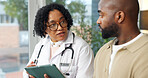 Doctor, tablet and discussion in clinic with patient, medical help and explain treatment for disease. Healthcare worker, tech and talk in consultation with person, evaluation and advice for illness.