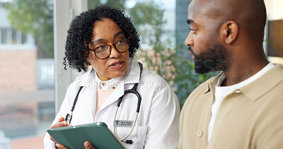 Buy stock photo Doctor, tablet and discussion in clinic with patient, medical help and explain treatment for disease. Healthcare worker, tech and talk in consultation with person, evaluation and advice for illness.