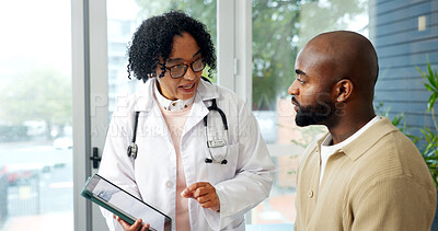Buy stock photo Doctor, tablet and conversation in clinic with patient, medical survey and questions about symptoms. Healthcare worker, tech and discussion in consultation with person, wellness evaluation or advice.