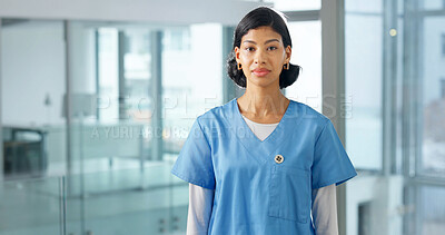 Buy stock photo Portrait, nurse and student at hospital for medical, education and residency for patient care. Serious, woman or learning in workplace for nursing, internship and career pride for healthcare services